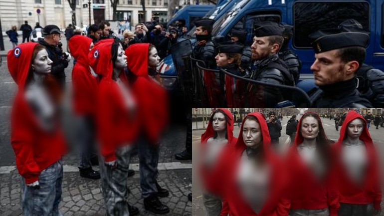 فرنسيات يقفن صامتات بالزي الأحمر عاريات الصدور أمام قوات الأمن الفرنسية اثناء احتجاجات السترات الصفراء